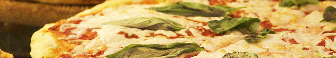Eating Italian Pizza at Slices Pizza by Tony restaurant in Greensboro, NC.
